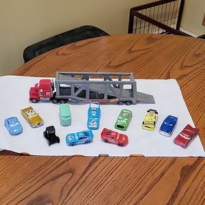 Vintage Disney Pixar Cars Mack Truck loader set with 11 die cast Disney cars